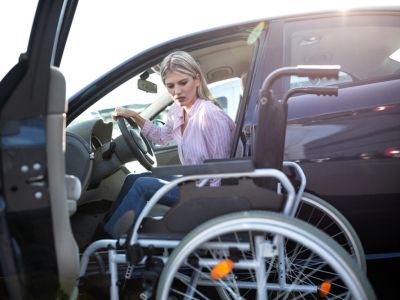 Female in Palmetto, FL Entering a Car with Vehicle Hand Controls