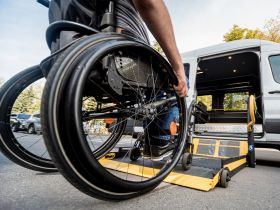 Man in a Wheelchair Entering a Handicap Van in Sarasota, FL